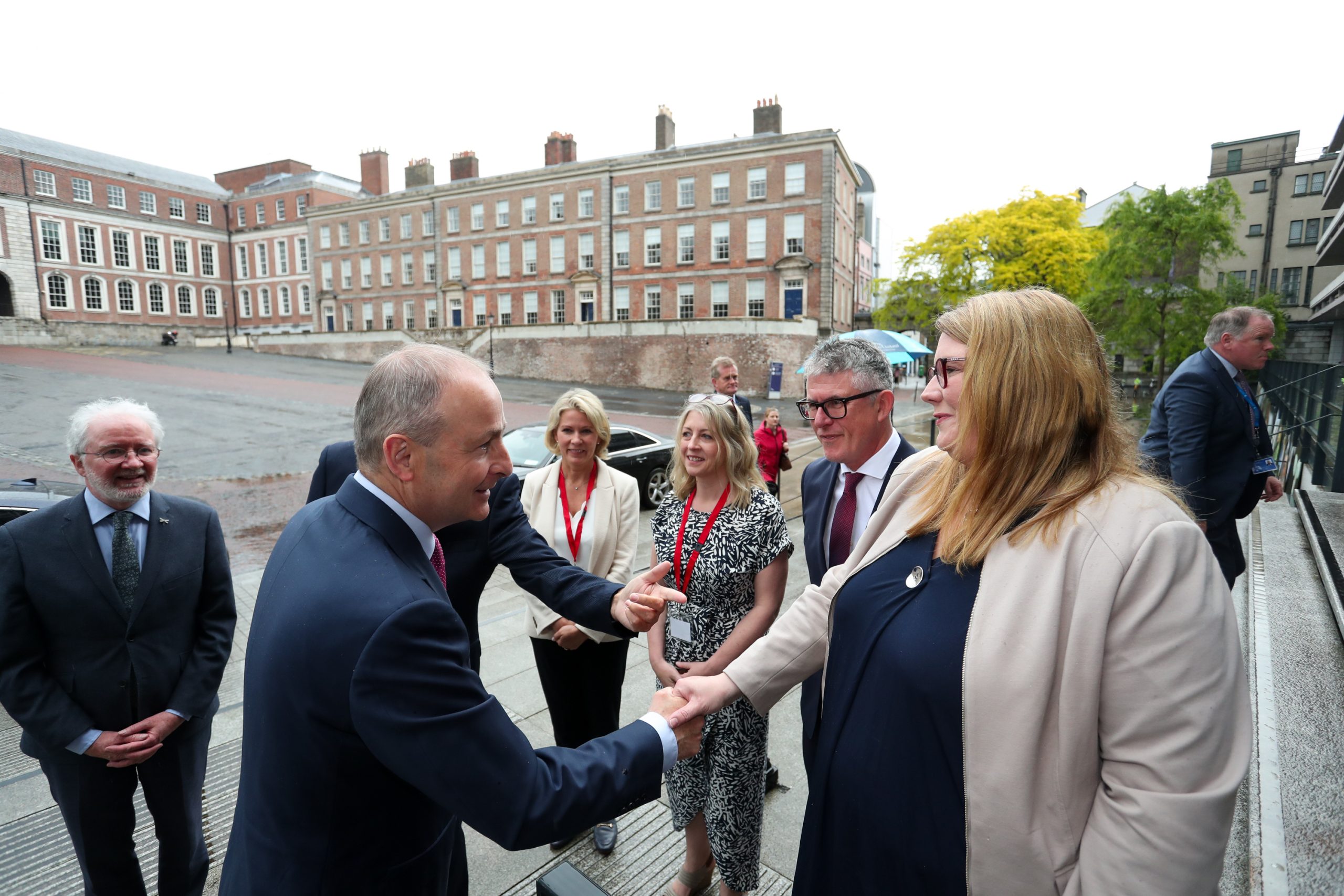 Taoiseach Micheal Martin is welcomed by the staff.