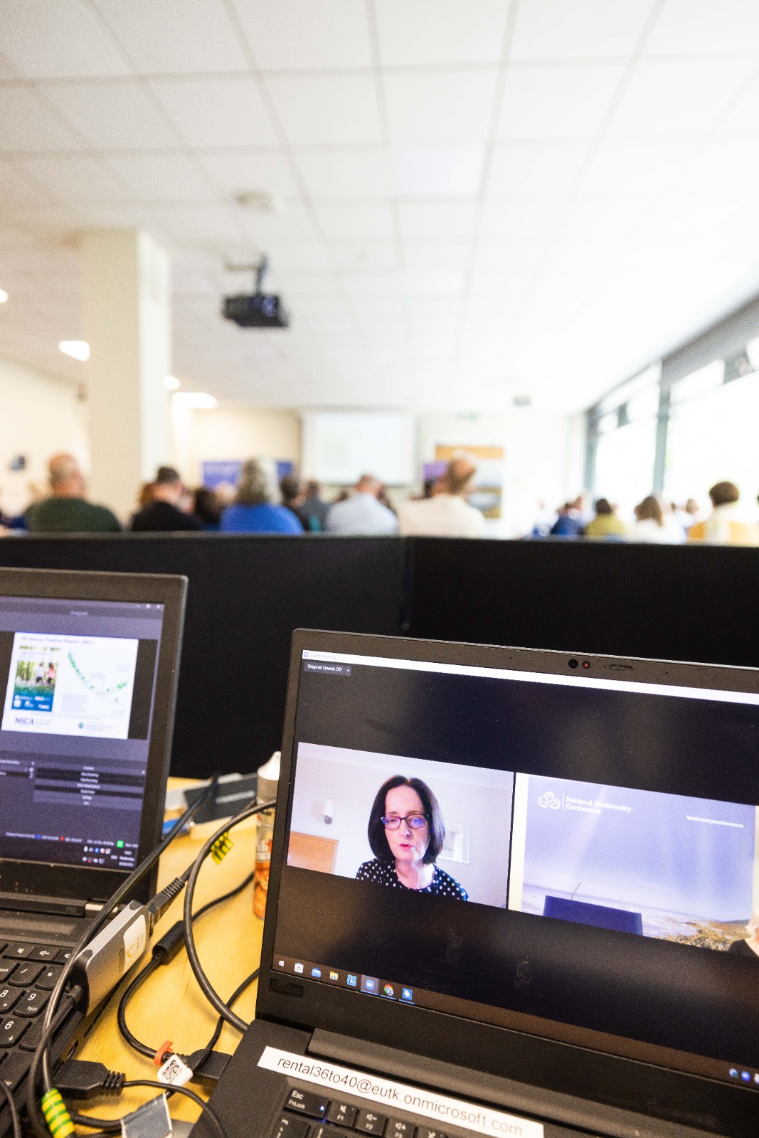 Attendee participating in a Zoom meeting during conference.